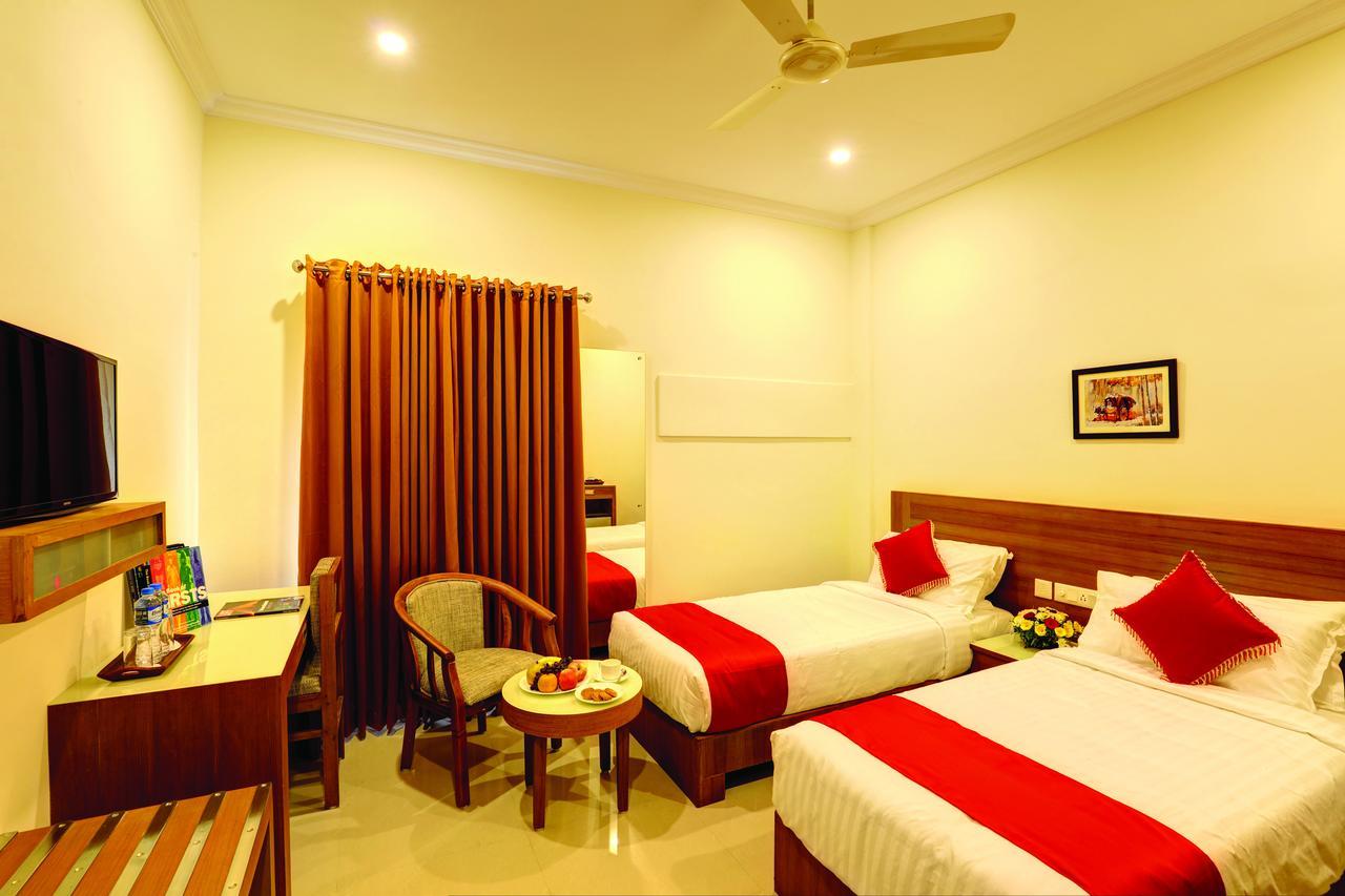 Hotel Floral Park Kottayam Exterior photo
